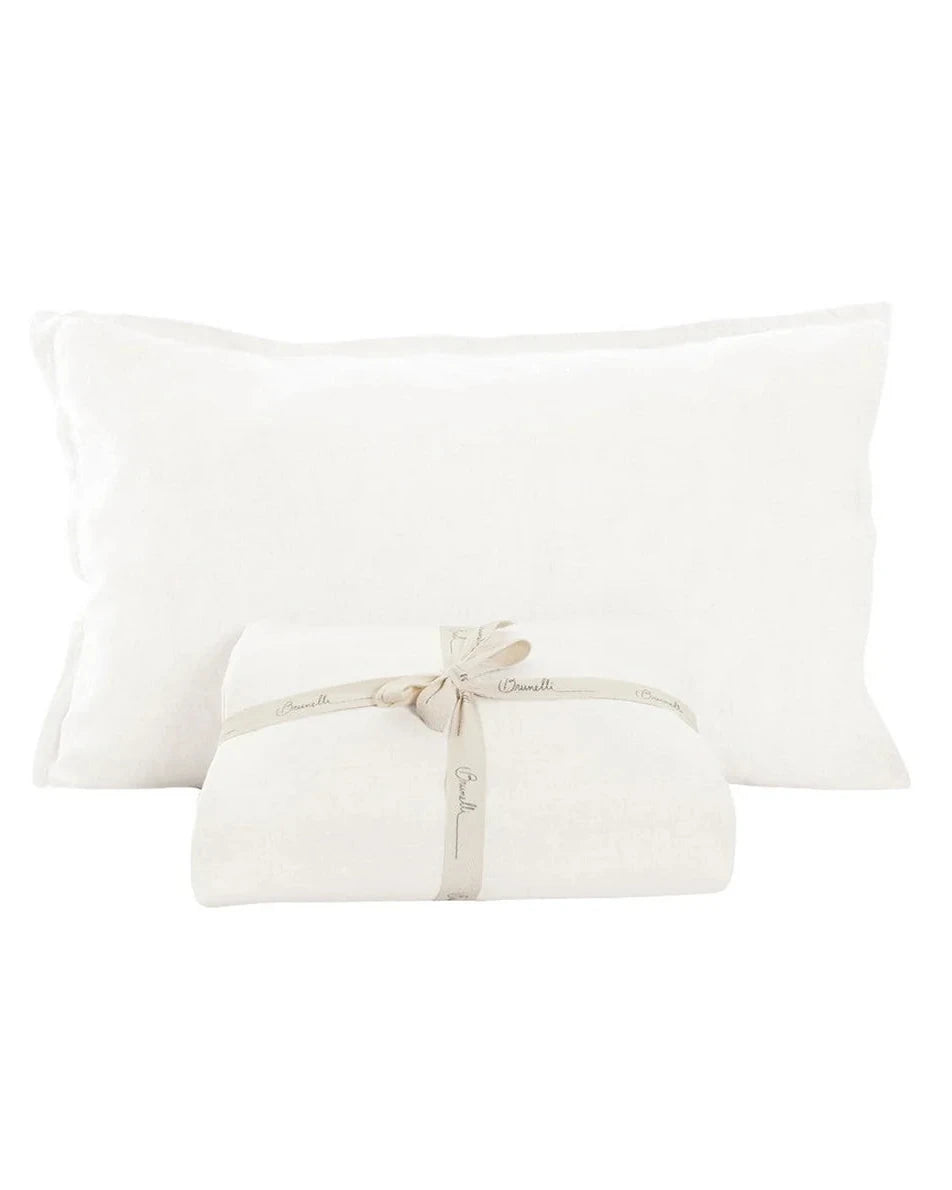 White pillowcases Belgian linen with a beige tie on a white background